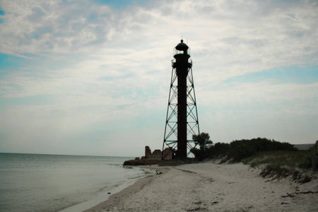 Old lighthouse on the beachの写真素材