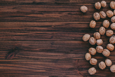 nuts on a wooden background