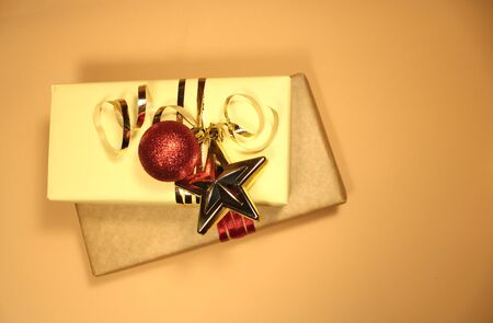 Collection of Christmas gift boxes, Christmas tree red balls and stars for pattern layout design on beige. The view from the top. Flat layの写真素材