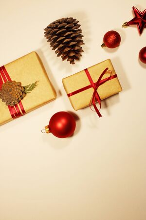 Christmas wreath decor, gift box, red balls, red stars, fir cone on a white background. The view from the top. Christmas wreath.の写真素材