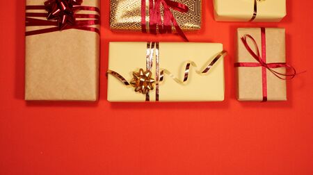 Christmas wreath decor, red balls, red and gold stars on a red background. The view from the top. Christmas wreath.の写真素材