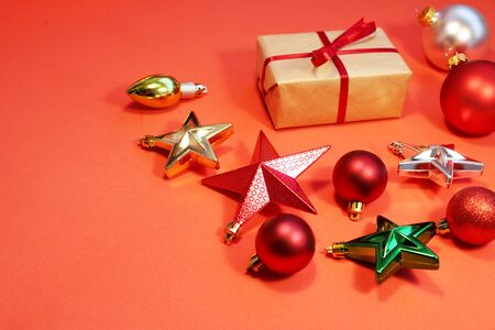 Christmas wreath decor, red balls, red and gold stars on a red background. The view from the top. Christmas wreath.の写真素材
