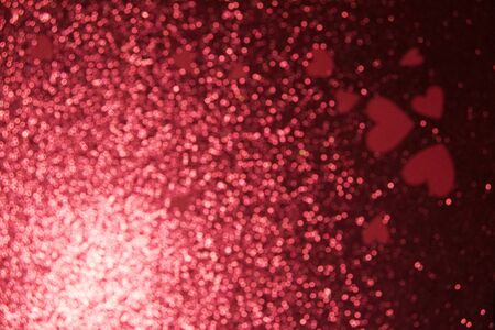 Blurred background with sequins and a big heart for Valentine's Day, Valentine's Day. The concept of loveの写真素材