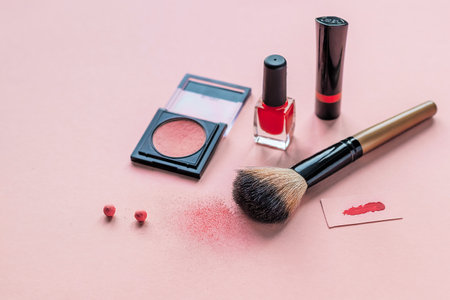 Makeup blog concept. Female cosmetics and fashion items on pink background with copy space. Colored monochrome. Beauty background.の写真素材