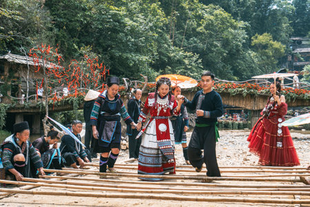 Sa Pa, Vietnam- 05.12.2024. Women enjoying traditional bamboo danceの写真素材