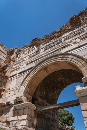 Ancient stone archway of the Basilica of St. John. High quality photo. A view of an ancient stone...