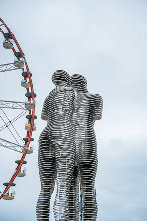 A kinetic steel sculpture of two figures, representing the tragic love story of Ali and Nino.の写真素材