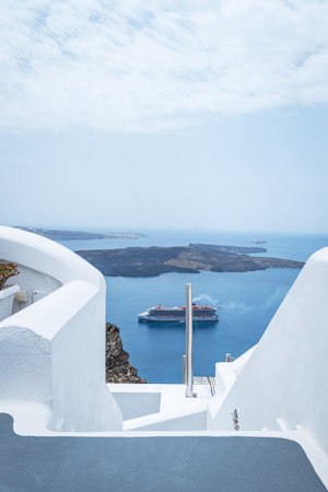 Cruise ship seen from white steps in Santorini.の写真素材