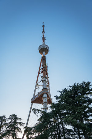 The iconic Tbilisi TV Tower and its observation deck, located on Mount Mtatsminda, stands tall...
