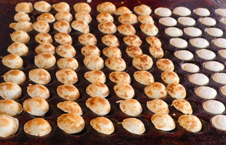 freshly baked traditional Dutch mini pancakes の写真素材