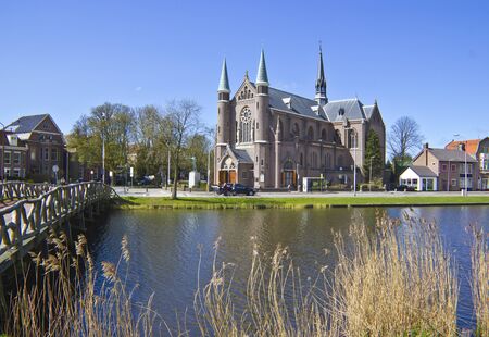 bridge to church, Alkmaar town, Holland, the Netherlandsの写真素材