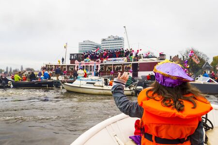 AMSTERDAM, NETHERLANDS - NOVEMBER, 18, 2012  Sinterklaas arrives in Holland by boatのeditorial素材