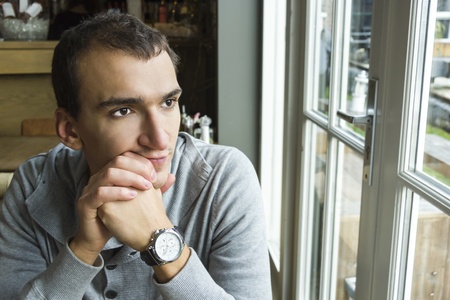 Portrait of handsome man, close up of young businessman indoorsの写真素材