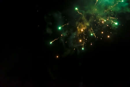 Beautiful fireworks on the black sky backgroundの写真素材