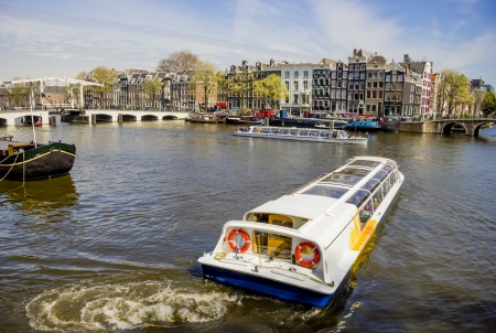 View on Amsterdam and Amstel rive with cruise boats , the Netherlandsの写真素材