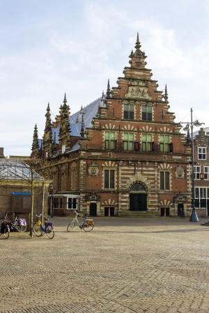 Old typical Dutch house into the sunset, Haarlem, the Netherlandsの写真素材