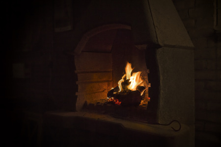 burning wood in open fire placeの写真素材