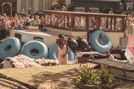Amsterdam, Netherlands - August 3, 2013: A vintage color tone picture  of Amsterdam gay parade in a...