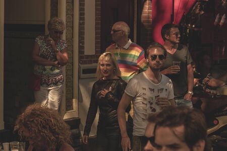 Amsterdam, Netherlands - August 3, 2013: A vintage color tone picture  of Amsterdam gay parade in a...