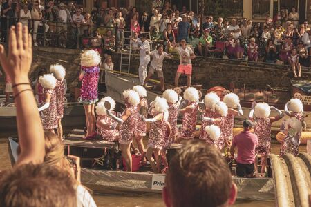 Amsterdam, Netherlands - August 3, 2013: A vintage color tone picture  of Amsterdam gay parade in a canal on a sunny day with people having fun dancing on a boatのeditorial素材