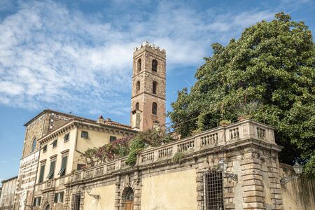 The square near the church of Santi Giovanni e Reparata, with its adjacent Baptistery, was built in the 4th century as the cathedral of Lucca, maintaining that role until the 8th centuryの写真素材