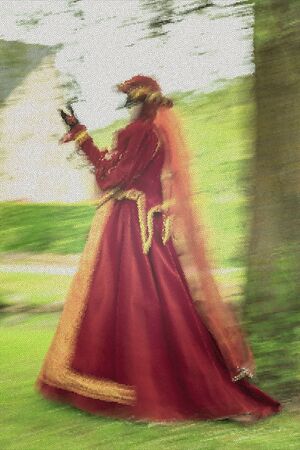 A ghost woman from the back in red dress and veil in a park.の写真素材