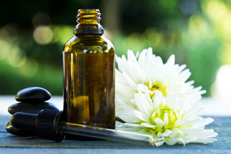 spa concept with body oils and stonesの写真素材