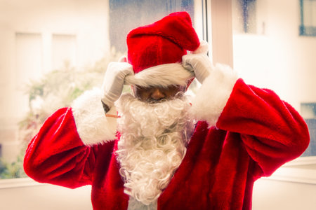 santa claus isolated on background with stress or tiredの写真素材