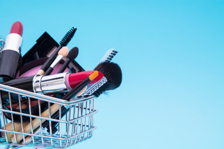 Shopping basket with make-up and cosmetic productsの写真素材