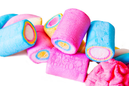 colorful marshmallows isolated on whiteの写真素材