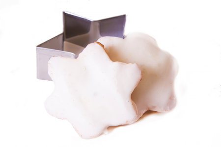 Christmas sweets and cookies with mold isolated on whiteの写真素材