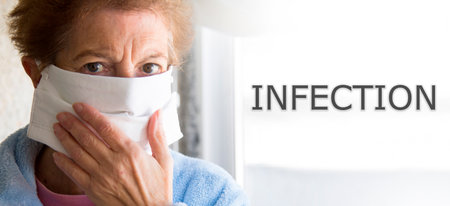 portrait of senior woman with disposable medical mask. Safety in public places during coronavirus outbreak.の写真素材