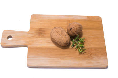 table with nuts isolated on whiteの写真素材