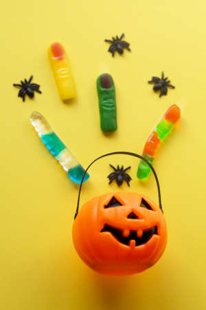 Pumpkin bag with Halloween candies. Halloween partyの写真素材