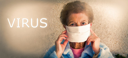 portrait of senior woman with disposable medical mask. Safety in public places during  outbreak.の写真素材