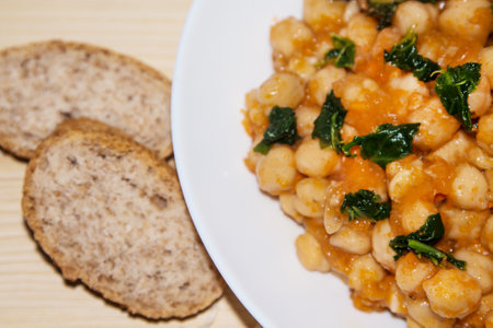 delicious chickpeas cooked with spinachの写真素材