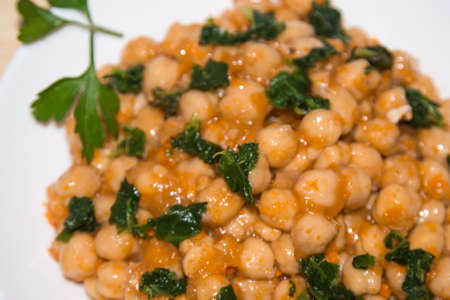 delicious chickpeas cooked with spinachの写真素材