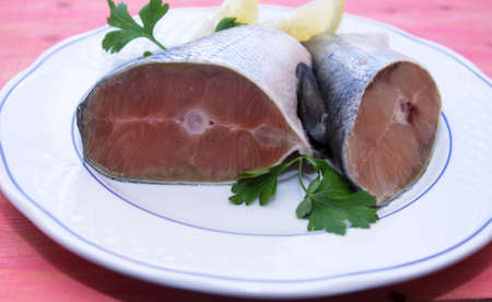 fresh salmon with parsley and lemonの写真素材