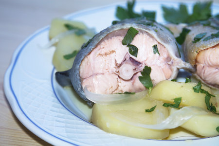 fresh fish, salmon tails cooked with potatoesの写真素材