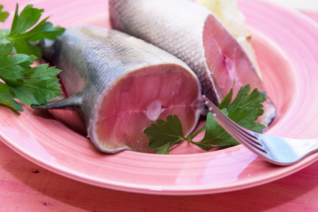 fresh fish with lemon and parsleyの写真素材
