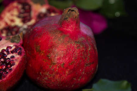pomegranate fruit on black backgroundの写真素材