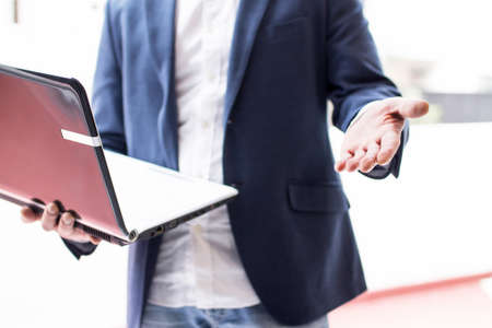 businessman doing demonstration with his pcの写真素材