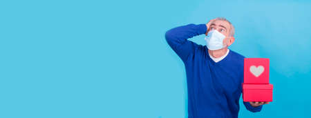 attractive man with protective mask on his face