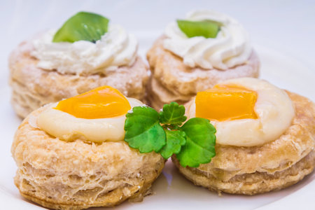assortment of cakes of various fruits isolatedの写真素材