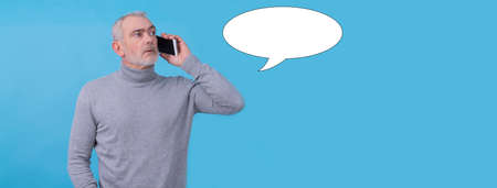 adult casual man with mobile phone isolatedの写真素材