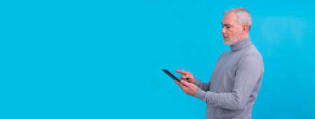 man using digital tablet isolatedの写真素材