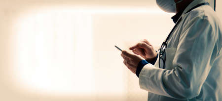 doctor giving her diagnosis by mobile phone