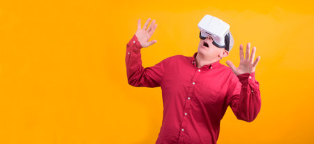man with 3d virtual reality glasses pointing at what he sees in space, new technology conceptの写真素材