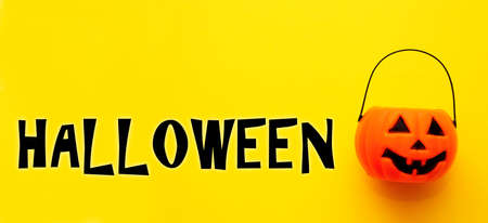 halloween pumpkin on lilac backgroundの写真素材