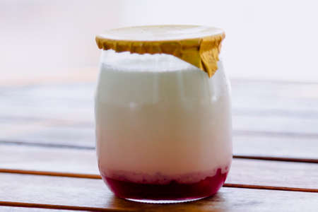 Greek yogurt in a glass jarsの写真素材